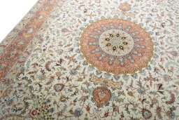 Backside of handmade New Tabriz 50/60/70 Raj rug showing knot structure and weave density