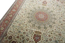 Backside of handmade New Tabriz 50/60/70 Raj rug showing knot structure and weave density