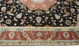 Corner detail of New Tabriz 50/60/70 Raj rug showing border pattern and Cork pile