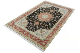 Corner detail of New Tabriz 50/60/70 Raj rug showing border pattern and Cork pile