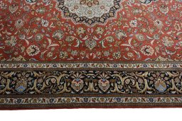 Corner detail of New Tabriz 50/60/70 Raj rug showing border pattern and Cork pile