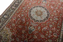 Backside of handmade New Tabriz 50/60/70 Raj rug showing knot structure and weave density