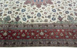 Corner detail of New Tabriz 50/60/70 Raj rug showing border pattern and Cork pile