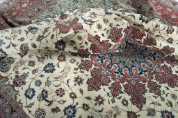 Surface texture of New Tabriz 50/60/70 Raj rug with natural Cork and intricate pattern