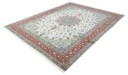 Corner detail of New Tabriz 50/60/70 Raj rug showing border pattern and Cork pile
