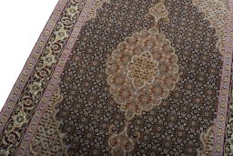 Backside of handmade New Tabriz 50/60/70 Raj rug showing knot structure and weave density