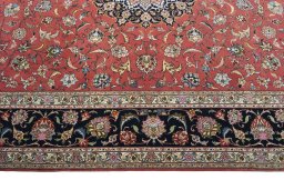 Corner detail of New Tabriz 50/60/70 Raj rug showing border pattern and Cork pile