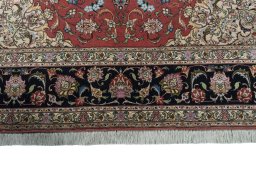 Full view of New Tabriz 50/60/70 Raj rug from Iran / Persia, 305 × 203 cm in Red tones