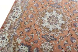 Backside of handmade New Tabriz 50/60/70 Raj rug showing knot structure and weave density