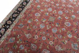 Backside of handmade New Tabriz 50/60/70 Raj rug showing knot structure and weave density