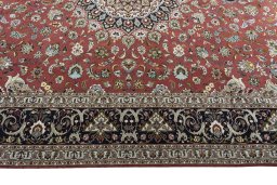 Corner detail of New Tabriz 50/60/70 Raj rug showing border pattern and Cork pile
