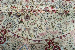 Corner detail of New Tabriz 50/60/70 Raj rug showing border pattern and Cork pile