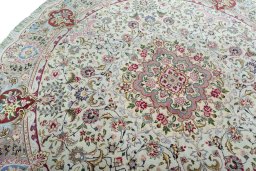 Backside of handmade New Tabriz 50/60/70 Raj rug showing knot structure and weave density