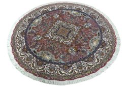 Corner detail of New Tabriz 50/60/70 Raj rug showing border pattern and Cork pile