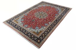 Corner detail of New Tabriz 50/60/70 Raj rug showing border pattern and Cork pile