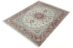 Corner detail of New Tabriz 50/60/70 Raj rug showing border pattern and Cork pile