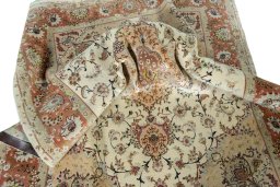 Surface texture of New Tabriz 50/60/70 Raj rug with natural Cork and intricate pattern