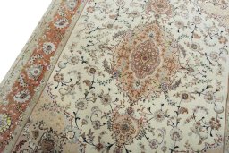 Backside of handmade New Tabriz 50/60/70 Raj rug showing knot structure and weave density