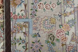 Backside of handmade New Tabriz 50/60/70 Raj rug showing knot structure and weave density