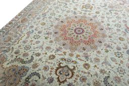 Backside of handmade New Tabriz 50/60/70 Raj rug showing knot structure and weave density
