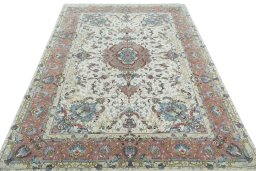 Surface texture of New Tabriz 50/60/70 Raj rug with natural Cork and intricate pattern