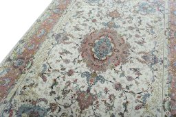 Backside of handmade New Tabriz 50/60/70 Raj rug showing knot structure and weave density