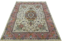 Surface texture of 2000s Tabriz 50/60/70 Raj rug with natural Cork and intricate pattern