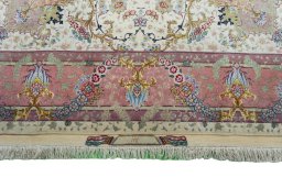 Close-up detail of 2000s Tabriz 50/60/70 Raj rug from Iran / Persia showing Cork weave