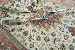 Surface texture of 2000s Tabriz 50/60/70 Raj rug with natural Cork and intricate pattern
