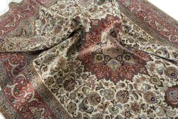 Surface texture of 2000s Tabriz 50/60/70 Raj rug with natural Cork and intricate pattern