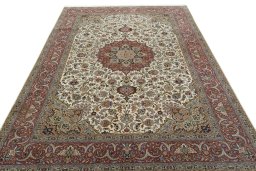 Surface texture of 2000s Tabriz 50/60/70 Raj rug with natural Cork and intricate pattern