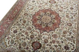 Backside of handmade 2000s Tabriz 50/60/70 Raj rug showing knot structure and weave density