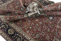 Surface texture of 2000s Tabriz 50/60/70 Raj rug with natural Cork and intricate pattern