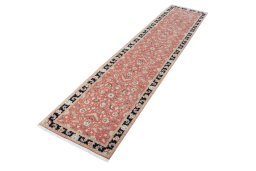 Corner detail of 2000s Tabriz 50/60/70 Raj rug showing border pattern and Cork pile