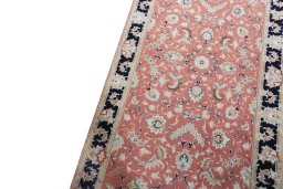 Backside of handmade 2000s Tabriz 50/60/70 Raj rug showing knot structure and weave density