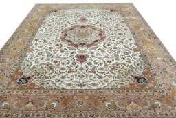 Surface texture of 2000s Tabriz 50/60/70 Raj rug with natural Cork and intricate pattern