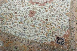 Close-up detail of 2000s Tabriz 50/60/70 Raj rug from Iran / Persia showing Cork weave