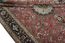 Close-up detail of 2000s Tabriz 50/60/70 Raj rug from Iran / Persia showing Cork weave