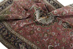 Surface texture of 2000s Tabriz 50/60/70 Raj rug with natural Cork and intricate pattern