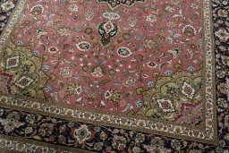 Close-up detail of 2000s Tabriz 50/60/70 Raj rug from Iran / Persia showing Cork weave