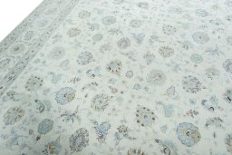 Backside of handmade 2000s Tabriz 50/60/70 Raj rug showing knot structure and weave density