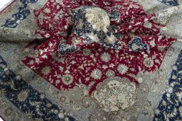 Surface texture of 2000s Tabriz 50/60/70 Raj rug with natural Cork and intricate pattern