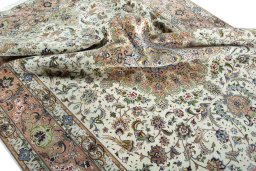 Surface texture of 2000s Tabriz 50/60/70 Raj rug with natural Cork and intricate pattern