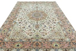 Surface texture of 2000s Tabriz 50/60/70 Raj rug with natural Cork and intricate pattern