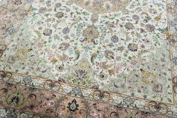 Close-up detail of 2000s Tabriz 50/60/70 Raj rug from Iran / Persia showing Cork weave
