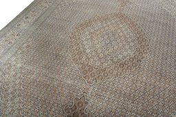 Backside of handmade 2000s Tabriz 50/60/70 Raj rug showing knot structure and weave density
