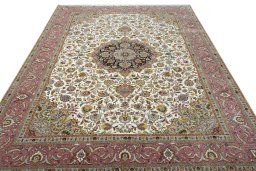 Surface texture of 2000s Tabriz 50/60/70 Raj rug with natural Cork and intricate pattern