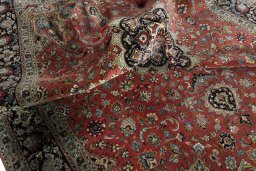 Surface texture of 2000s Tabriz 50/60/70 Raj rug with natural Cork and intricate pattern