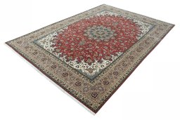 Corner detail of 2000s Tabriz 50/60/70 Raj rug showing border pattern and Cork pile