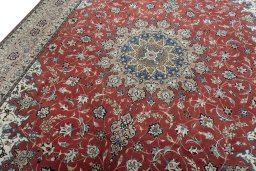 Backside of handmade 2000s Tabriz 50/60/70 Raj rug showing knot structure and weave density